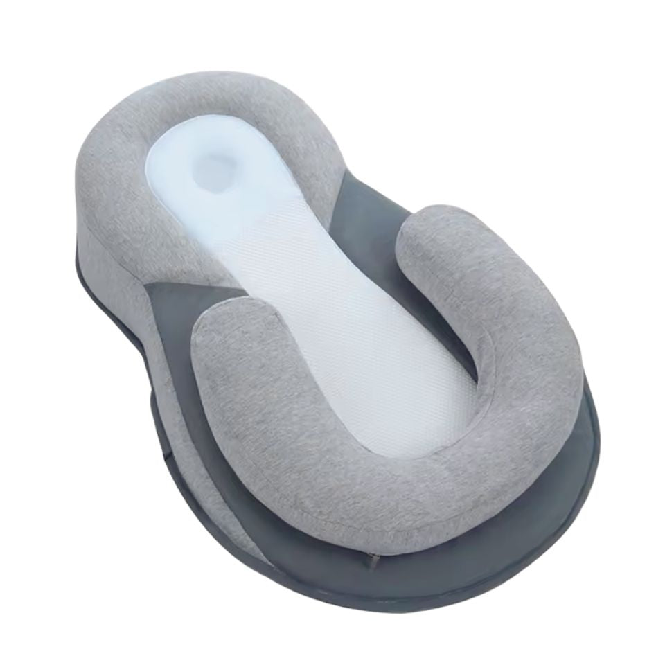 Coussin incliné pour bébé